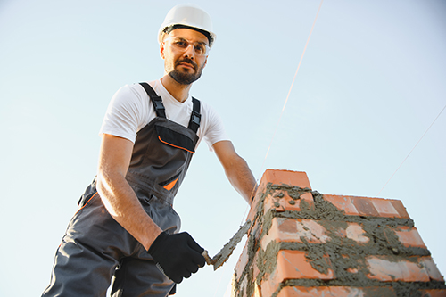 Hazlet chimney service employee at work