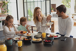 Family enjoying breakfast in Lavallette vacation rentals